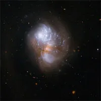 Hình ảnh ngoạn mục khi 2 thiên hà sáp nhập với nhau từ kính viễn vọng Hubble