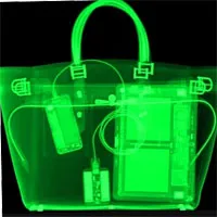 Vì sao laptop luôn phải bỏ ra khỏi hành lý xách tay khi qua máy soi chiếu?