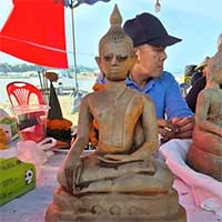 Lào khai quật phát hiện nhiều tượng Phật bằng đồng