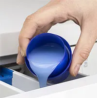 Dùng nước giặt cửa trên cho máy cửa trước có sao không?