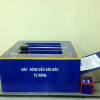 Nhóm sinh viên dùng đồ “ve chai” làm máy đóng dấu tự động