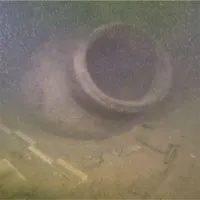 Khai quật kho báu dưới đáy hồ thiêng
