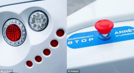 Đèn chiếu, cảm biến của Navia (trái) và nút dừng khẩn cấp (phải).