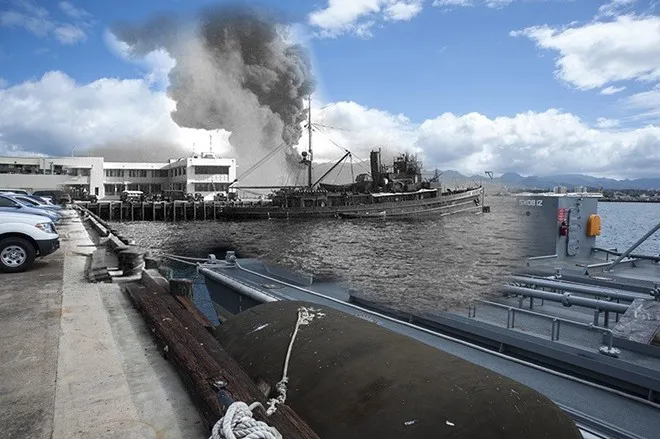 Chiến hạm USS Arizona (BB 39) bốc cháy nhìn từ đảo Ford.
