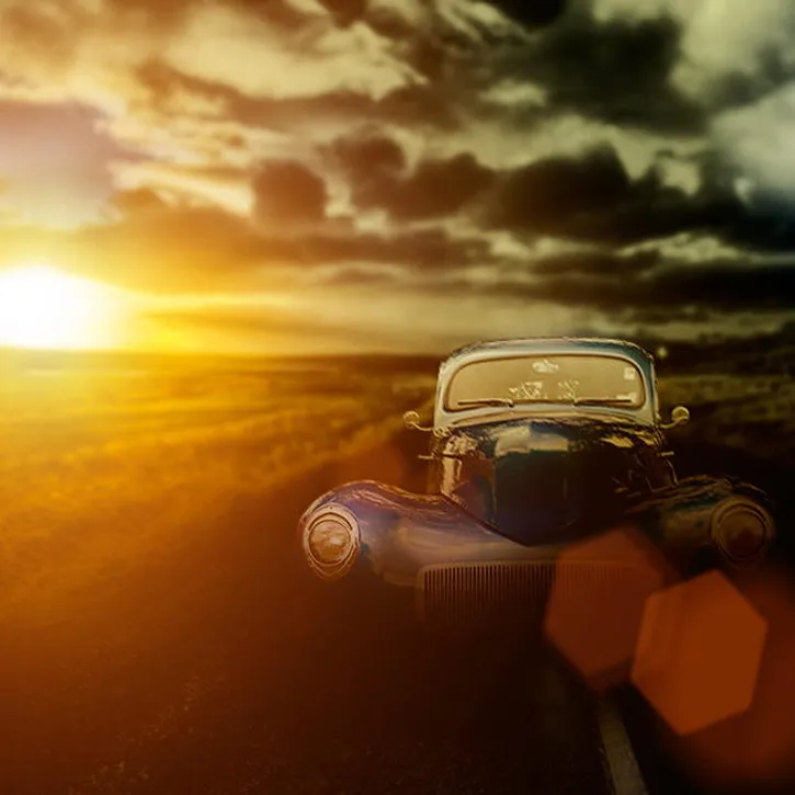 Classic car on country road