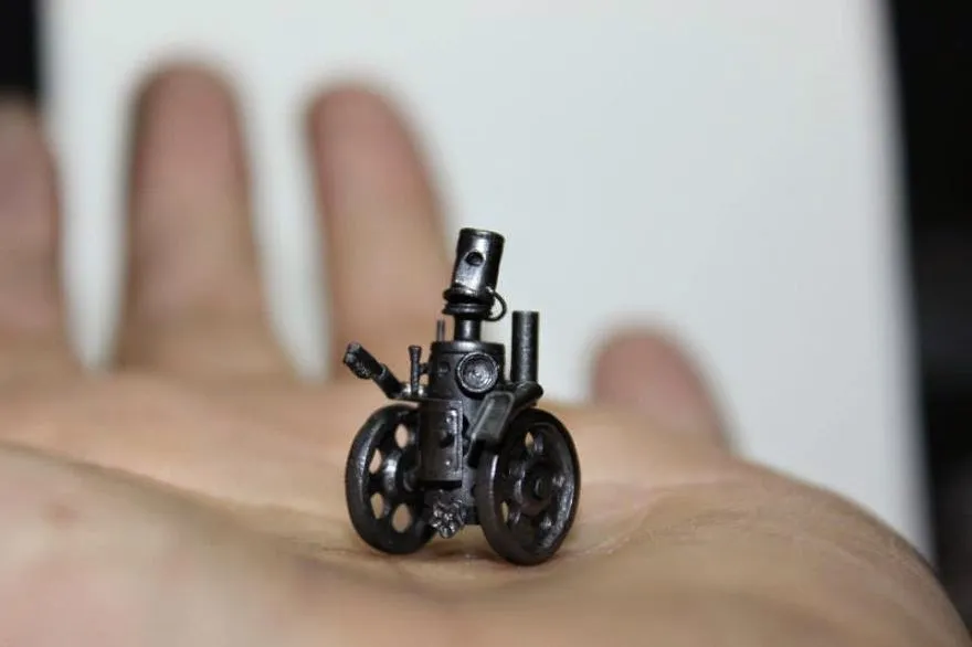 Robot tí hon nằm gọn trong lòng bàn tay.